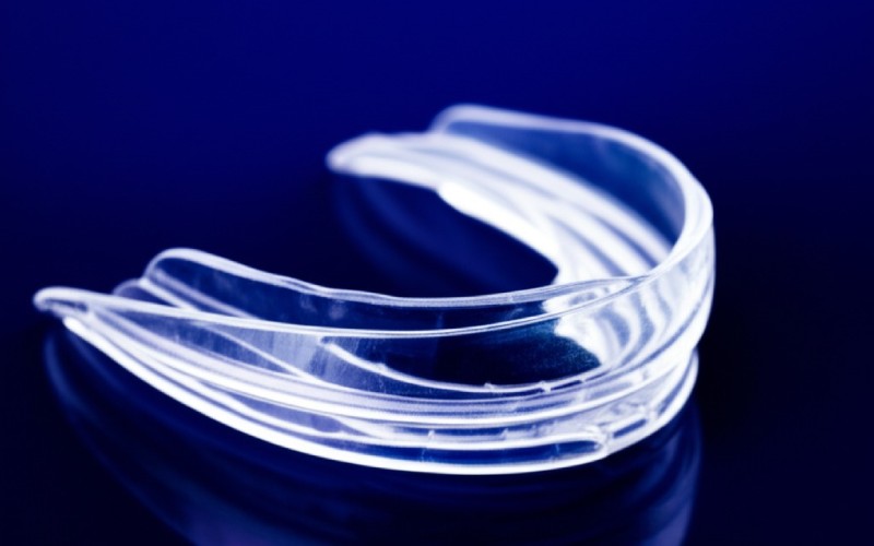 Sleep apnea oral appliance device